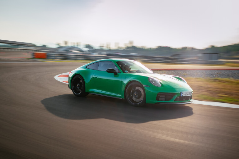 Wheels Reviews 2021 Porsche 911 Carrera GTS Python Green Dynamic Front Track Cornering Drive Left