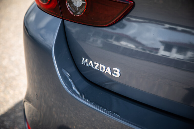 Wheels Reviews 2022 Mazda 3 G 25 Evolve SP Sedan Polymetal Grey Metallic Australia Detail Bootlid Nameplate S Rawlings