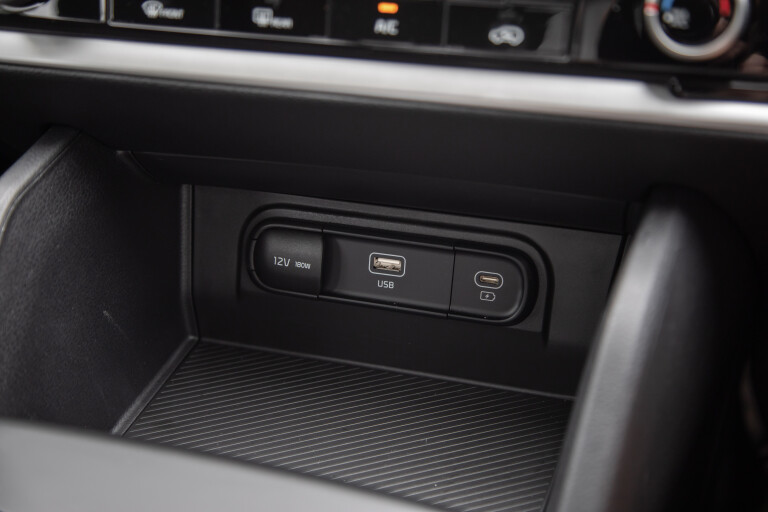 Wheels Reviews 2022 Kia Sportage S Australia Interior Front Centre Console Charging Port Panel S Rawlings