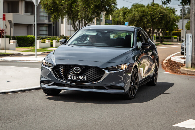 Wheels Reviews 2022 Mazda 3 G 25 Evolve SP Sedan Polymetal Grey Metallic Australia Dynamic Front 1 S Rawlings