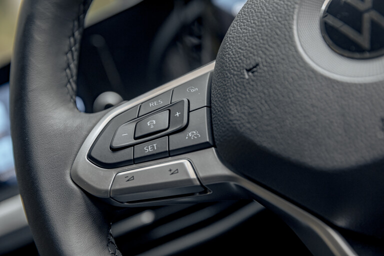 Wheels Reviews 2021 Volkswagen Golf Base Model Grey Interior Steering Wheel Driver Assistance Controls