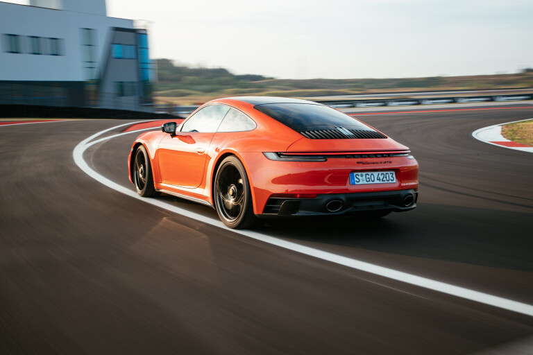 Wheels Reviews 2021 Porsche 911 Carrera 4 GTS Lava Orange Dynamic Rear Cornering
