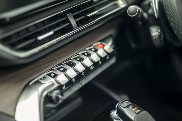 Wheels Reviews 2022 Peugeot 3008 GT Sport Plug In Hybrid Australia Interior Infotainment Control Buttons A Brook