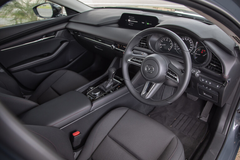 Wheels Reviews 2022 Mazda 3 G 25 Evolve SP Sedan Australia Interior Cabin S Rawlings