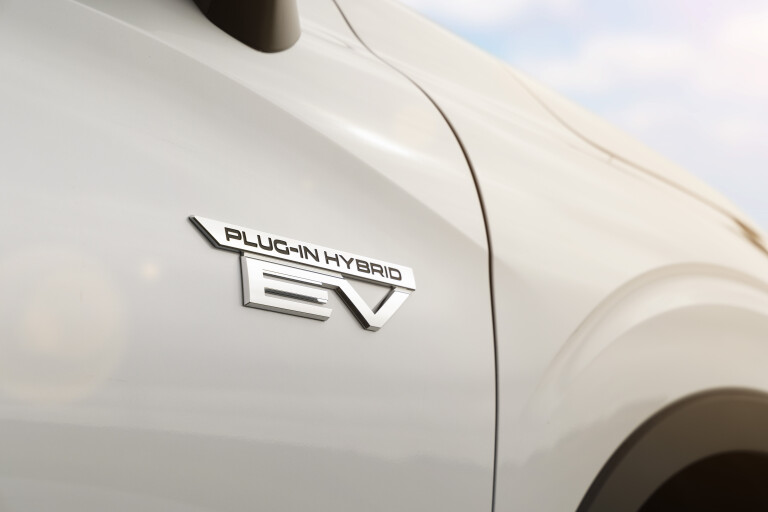 Wheels Reviews 2022 Mitsubishi Outlander PHEV Exceed White Australia Detail Front Fender Badge