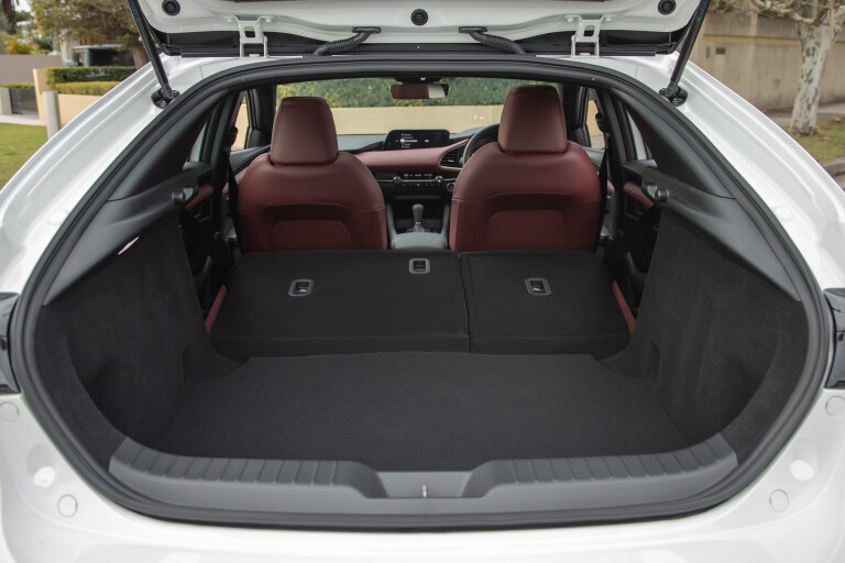 Wheels Reviews 2021 Mazda 3 Astina Hatch Cargo Space Seat Folded