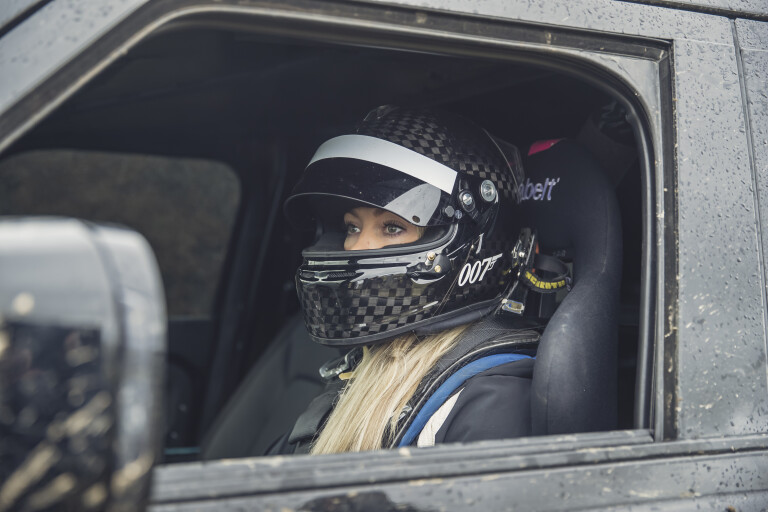 Motor Features LR Defender Behind The Scenes Image Of Stunt Driver Jessica Hawkins With The New Defender Featured In No Time To Die 131119