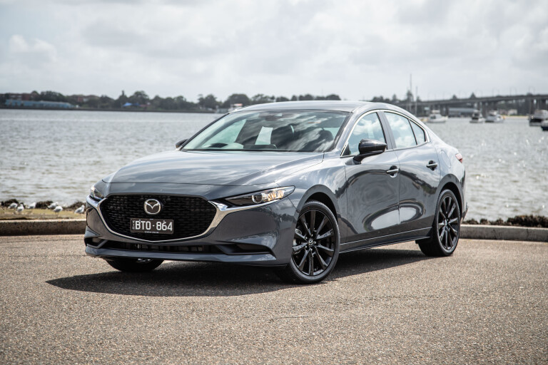 Wheels Reviews 2022 Mazda 3 G 25 Evolve SP Sedan Polymetal Grey Metallic Australia Static Front 1 S Rawlings