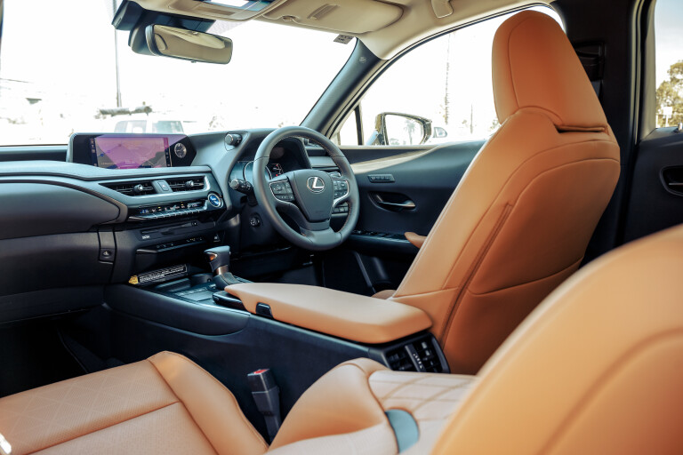 Wheels Reviews 2021 Lexus UX 250 H Sport Luxury AWD Sonic Quartz Interior Driver Seat Long Term Review E Dewar