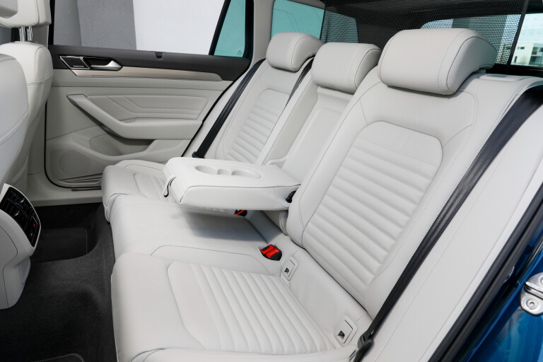 Wheels Reviews 2021 Volkswagen Passat 162 TSI Alltrack Premium Aquamarine Blue Metallic Interior Rear Seat Centre Armrest Australia C Brunelli