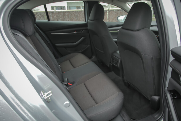 Wheels Reviews 2022 Mazda 3 G 25 Evolve SP Australia Interior Rear Seat S Rawlings