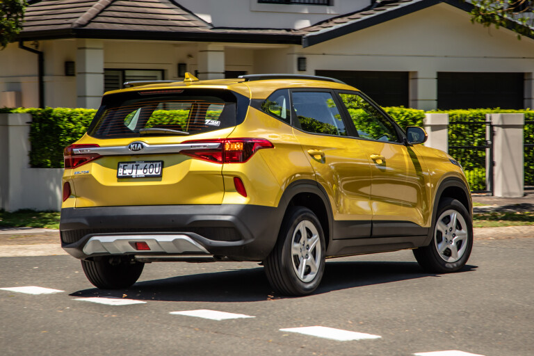 Wheels Reviews 2022 Kia Seltos S Starbright Yellow Dynamic Rear Turning Australia S Rawlings