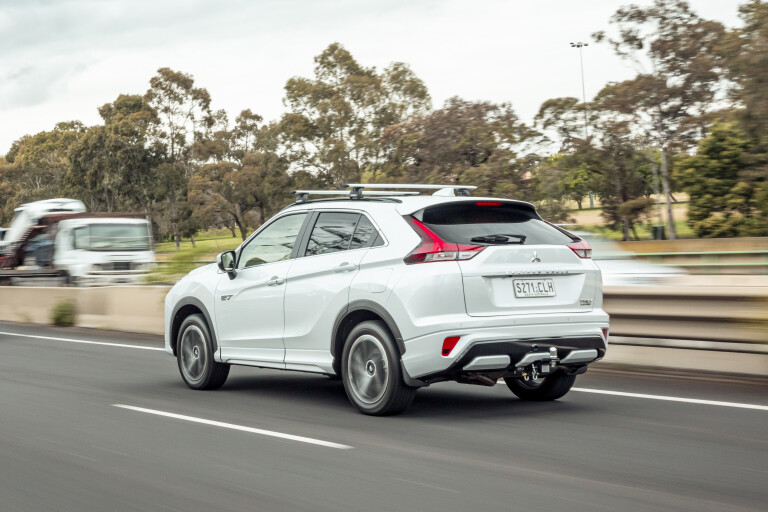Wheels Reviews 2021 Mitsubishi Eclipse Cross PHEV Aspire White Dynamic Rear Highway