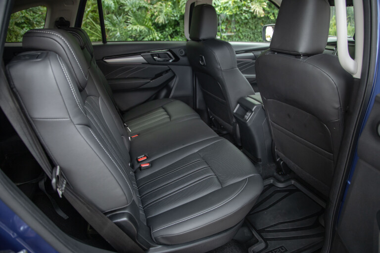 Wheels Reviews 2021 Isuzu MU X LS T Long Term Cobalt Blue Mica Australia Interior Rear Seat Headroom Legroom Space S Rawlings