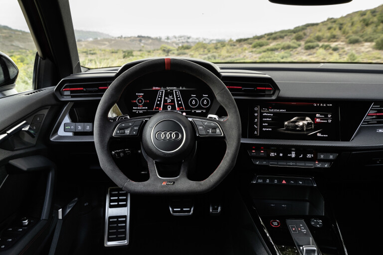 Wheels Reviews 2022 Audi RS 3 Sportback Tango Red Interior Driver Cockpit Layout Euro Spec
