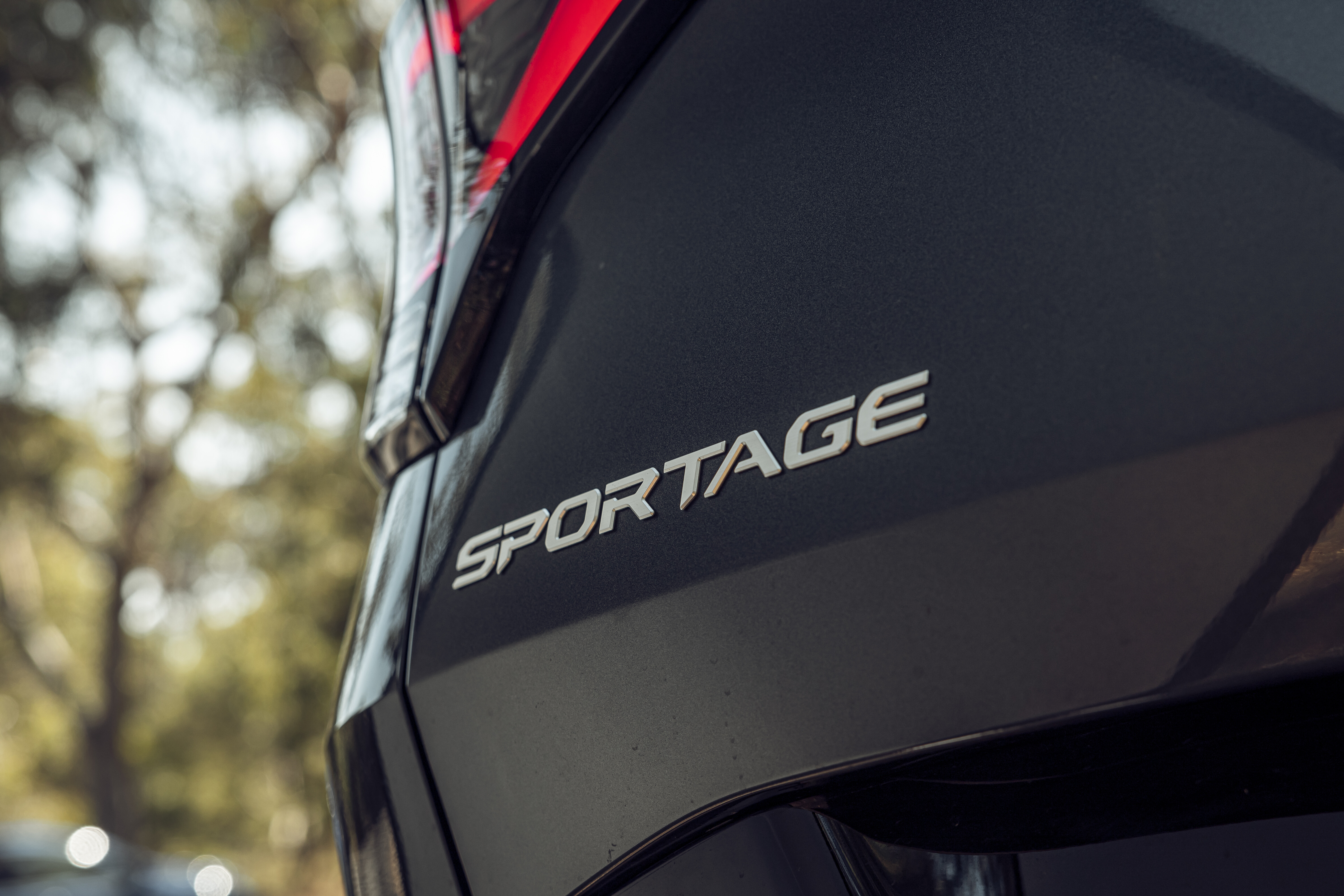 Wheels Reviews 2022 Kia Sportage SX Diesel Gravity Grey Australia Detail Tailgate Nameplate A Brook