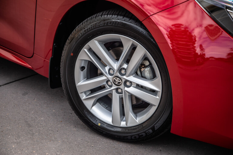 Wheels Reviews 2021 Toyota Corolla Ascent Sport Hybrid Jasper Red Detail Wheel