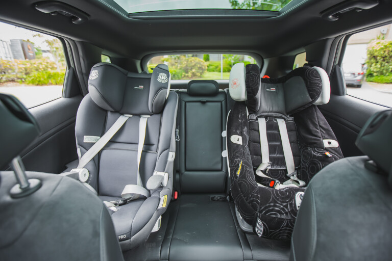 Wheels Reviews 2022 Kia Sportage GT Line Diesel AWD Jungle Wood Green Interior Rear Seat Child Seat Australia Long Term