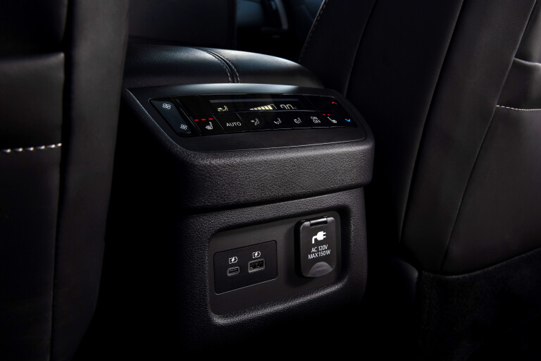 Wheels Reviews 2022 Nissan Pathfinder US Spec Interior Rear Centre Console Charging Port