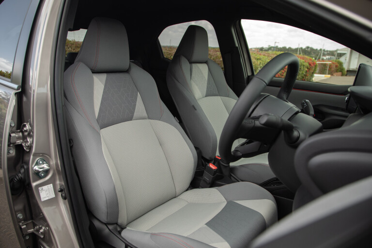 Wheels Reviews 2021 Toyota Yaris ZR Hybrid Bronx Bronze Australia Interior Front Seat S Rawlings