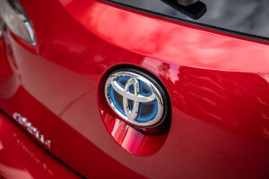 Wheels Reviews 2021 Toyota Corolla Ascent Sport Hybrid Jasper Red Detail Rear Badge