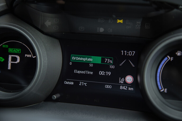 Wheels Reviews 2021 Toyota Yaris ZR Hybrid Bronx Bronze Australia Interior Instrument Cluster Drive Info Display S Rawlings