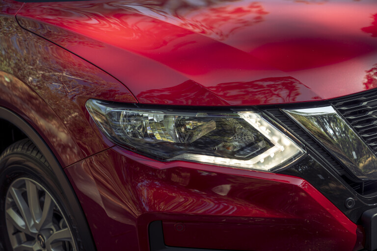 Wheels Reviews 2022 Nissan X Trail ST Ruby Red Australia Detail Headlight A Brook