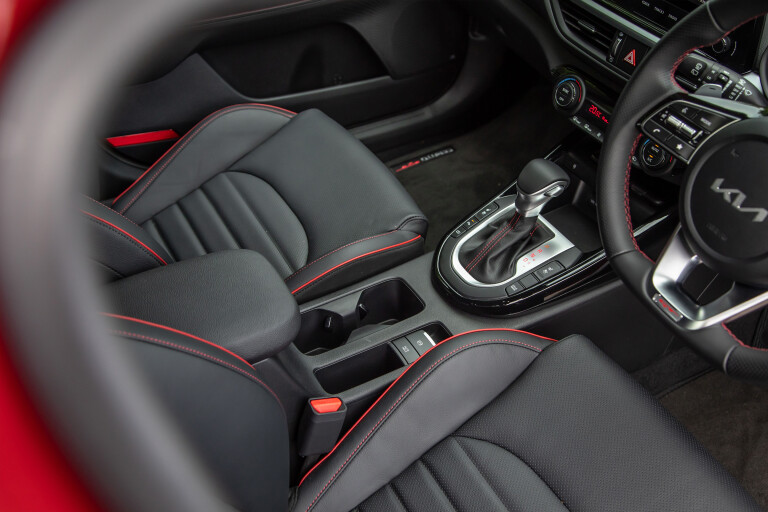 Which Car Car Reviews 2022 Kia Cerato GT Red Hatch Centre Console