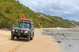 4x4 driving on Elim Beach in Queensland