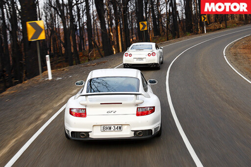 Nissan -GT-R-vs -Porsche -911-GT2-rear -driving