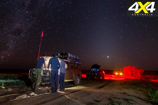 Fixing the cars under the stars