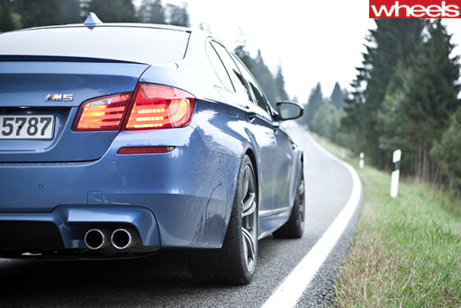 BMW-M5-driving -in -Germany -rear