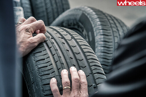 Checking -tread -on -worn -tyre