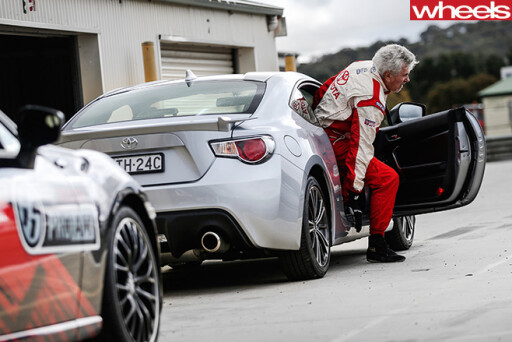 Toyota -86-Race -Car -driver -getting -out -of -Toyota -86