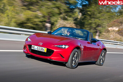 Mazda -MX-5-driving -roof -down