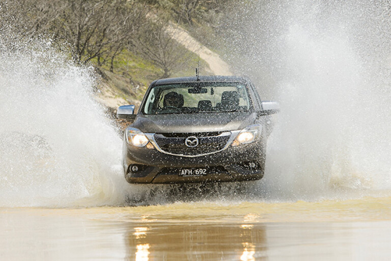 Mazda BT-50 at Fraser Island driving through water and sand