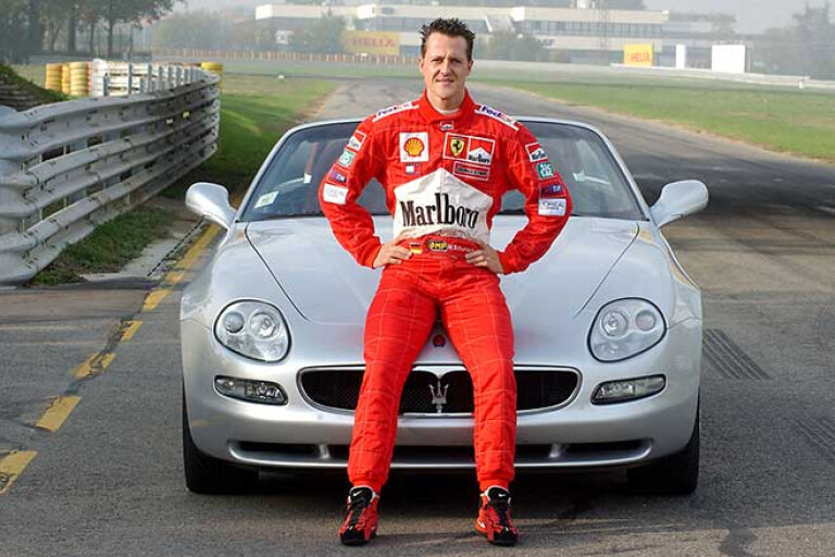 Michael Schumacher sitting on Maserati Spyder at Fiorano.