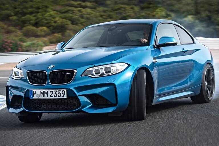 BMW M2 driving around a race track