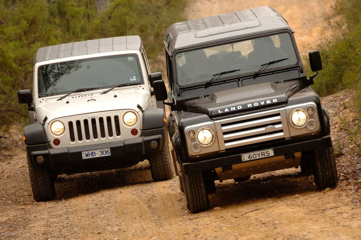2009 Land Rover Defender SVX vs Jeep Wrangler Unlimited 4x4 comparison  review