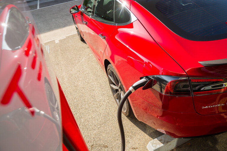 Electric Car Sales Tesla Plugged In Jpg