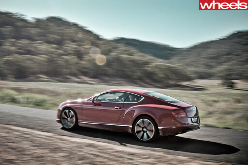 2013-Bentley -Continental -GT-driving -on -Bylong -Valley -Way -rear -side