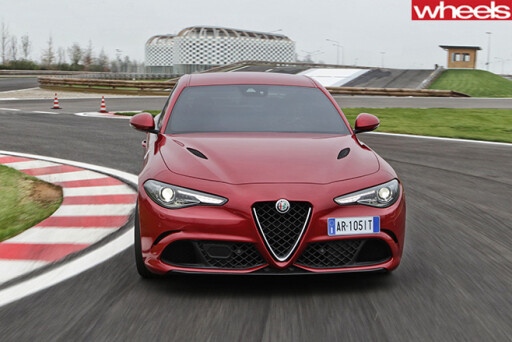 Alfa -Romeo _Quadrofoglio -front -driving -track
