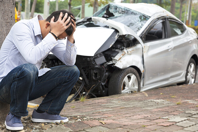 Worried man after car accident