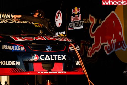Red -Bull -HRT-car -in -garage