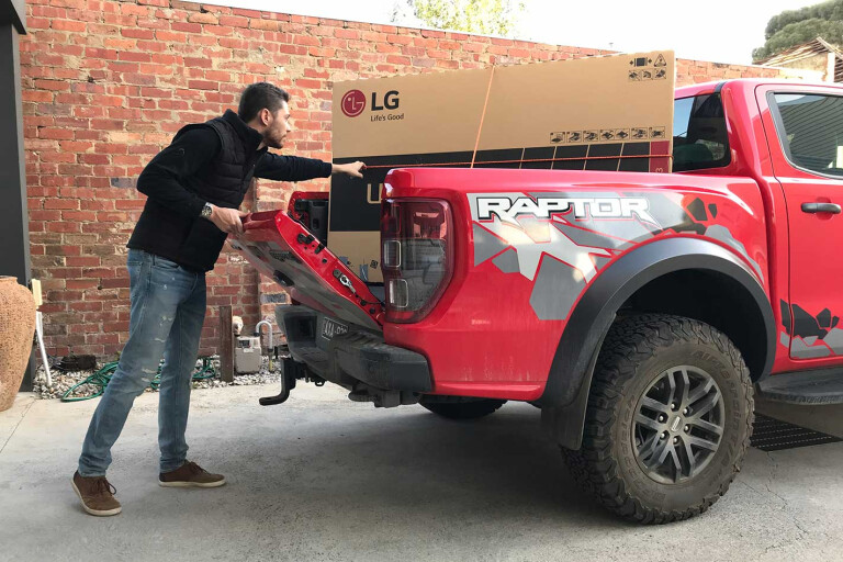 Loading the tray on a Ford Ranger Raptor