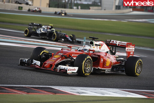 F1-Ferrari -race -car -driving -track