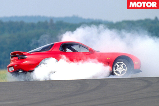 Mazda rx-7 burning rubber