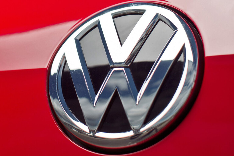 Volkswagen badge on Red Golf TDI