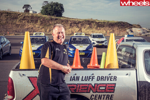 Ian -Luff -advanced -driving -course -instructor -standing -in -front -of -ute