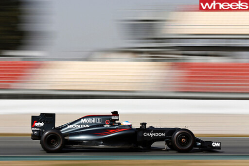 F1-black -car -driving